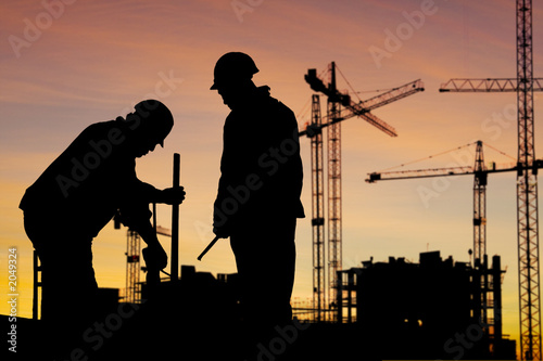 worker and cranes worker and cranes