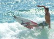 surfer cuts back