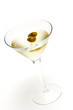 glass with martini and olives glass with martini and olives