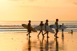 surfers at sunset surfers at sunset