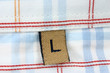 real macro of clothing label - size l real macro of clothing label - size l