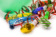 colourful, curly party streamers over white colourful, curly party streamers over white