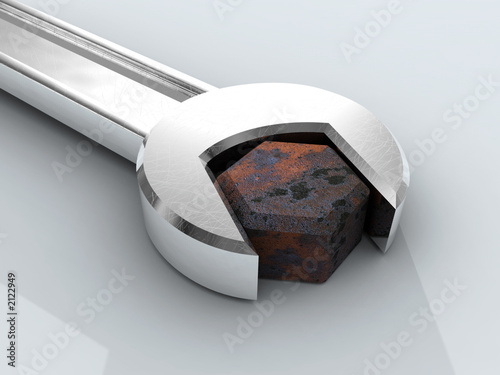 rusty bolt and chromium wrench