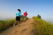 young couple running outdoors