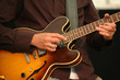 man playing guitar