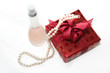 woman's gift with the pearl and perfume