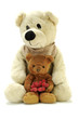 two teddy bears with hearts