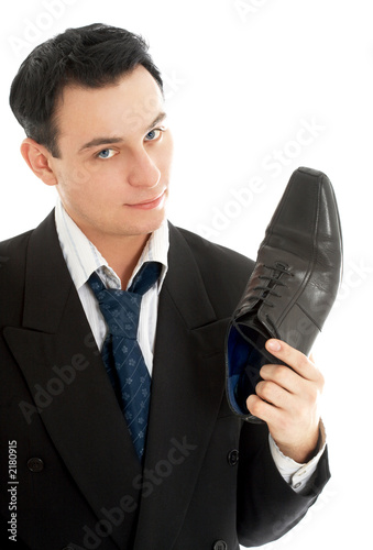salesman with black leather boot