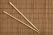 chopsticks and bamboo mat