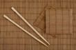 chopsticks and bamboo mat