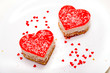 Photo: two heart-shaped cakes on the plate two heart-shaped cakes on the plate