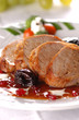 grilled pork meat with dry plum and redcurrant jam