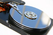 hard disk reflecting sky and bars on a white backg