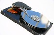 hard disk reflecting sky and bars on a white backg