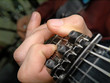 playing on a guitar