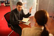 business man and woman talking in the office business man and woman talking in the office