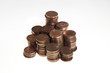 stacked one pence coins