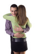 cuddling couple - man's face to the camera. cuddling couple - man's face to the camera.