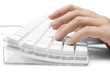 typing on a white computer keyboard