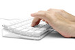 hands on a white computer keyboard