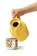 yellow teapot and cup