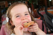 cute girl eating bread