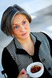 older businesswoman enjoying coffee
