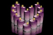 3d illustration of candles on a black background