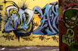 Photo: graffiti tags that are yellow and blue graffiti tags that are yellow and blue