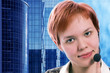 woman operator with headphones blue sky and business buildings