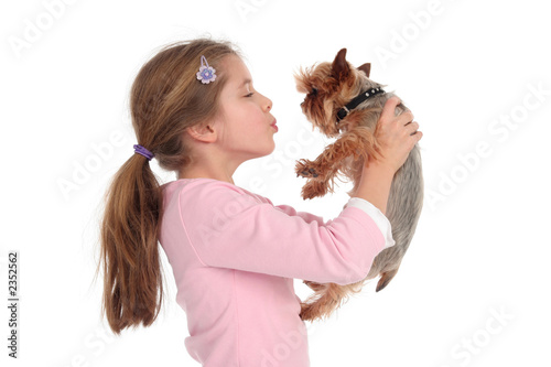 girl holding her dog