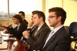 Photo: five professional people at the formal meeting. five professional people at the formal meeting.