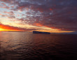 sunset with tabular iceberg