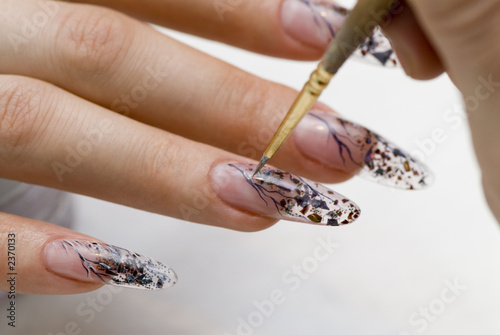 manicure one's nails.