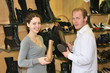 couple in shoes shop