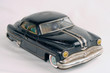 old black worn toy car from 50s