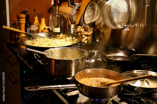 Photo: cooking at the stove cooking at the stove