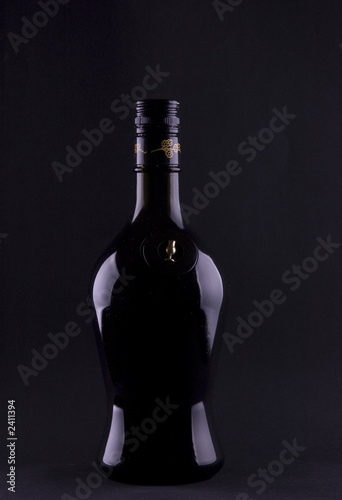 liqueur bottle contours on black liqueur bottle contours on black