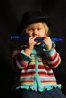 girl playing blue flute