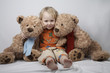 boy with teddy bears