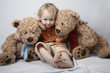 boy with teddy bears
