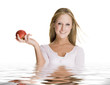girl holding an apple