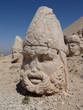 ruined statues of ancient gods