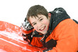 boy outdoors sledding