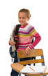 pretty school girl with books and backpack