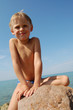 small naked boy in summer