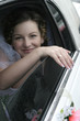 young bride smile in a limousine