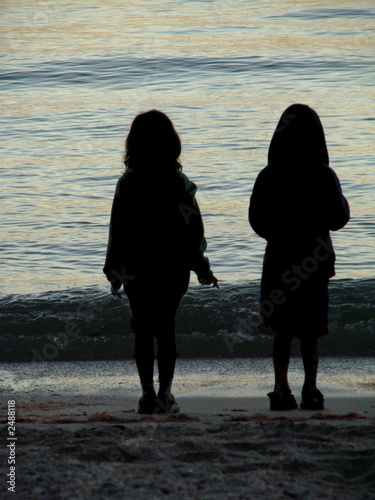 Photo: silhouetted children silhouetted children
