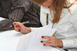 girl taking notes on the seminar girl taking notes on the seminar