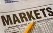 newspaper with business market results
